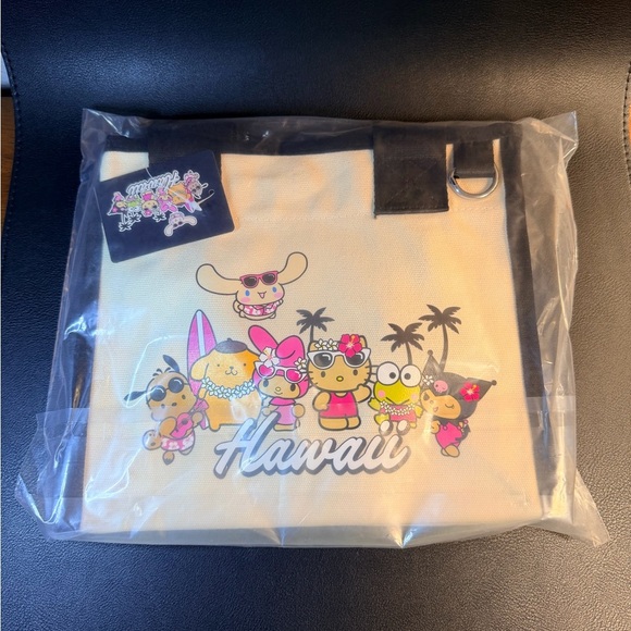 Hello Kitty Handbags - Hello Kitty “Hawaii Exclusive” Black and Cream Tote Bag